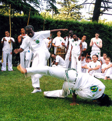 Mestre Poeira playing with Mestre Reizinho in 2003